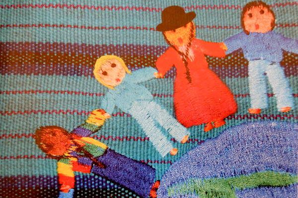 Close-up image of people holding each others wrists